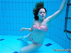 sexy girl demonstrates gorgeous figure underwater