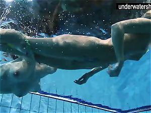 two killer amateurs showcasing their figures off under water